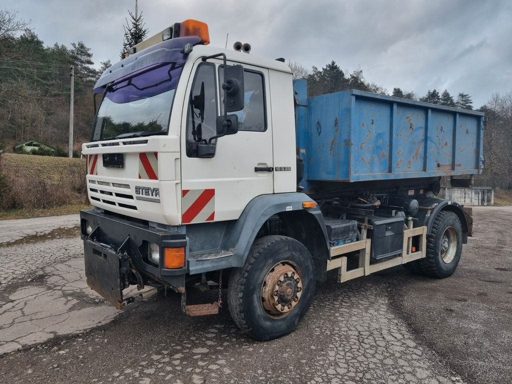 MAN (STEYR) 18.284 4x4 abrollkipper - Autocarro scarrabile: foto 1 MAN (STEYR) 18.284 4x4 abrollkipper - Autocarro scarrabile: foto 1