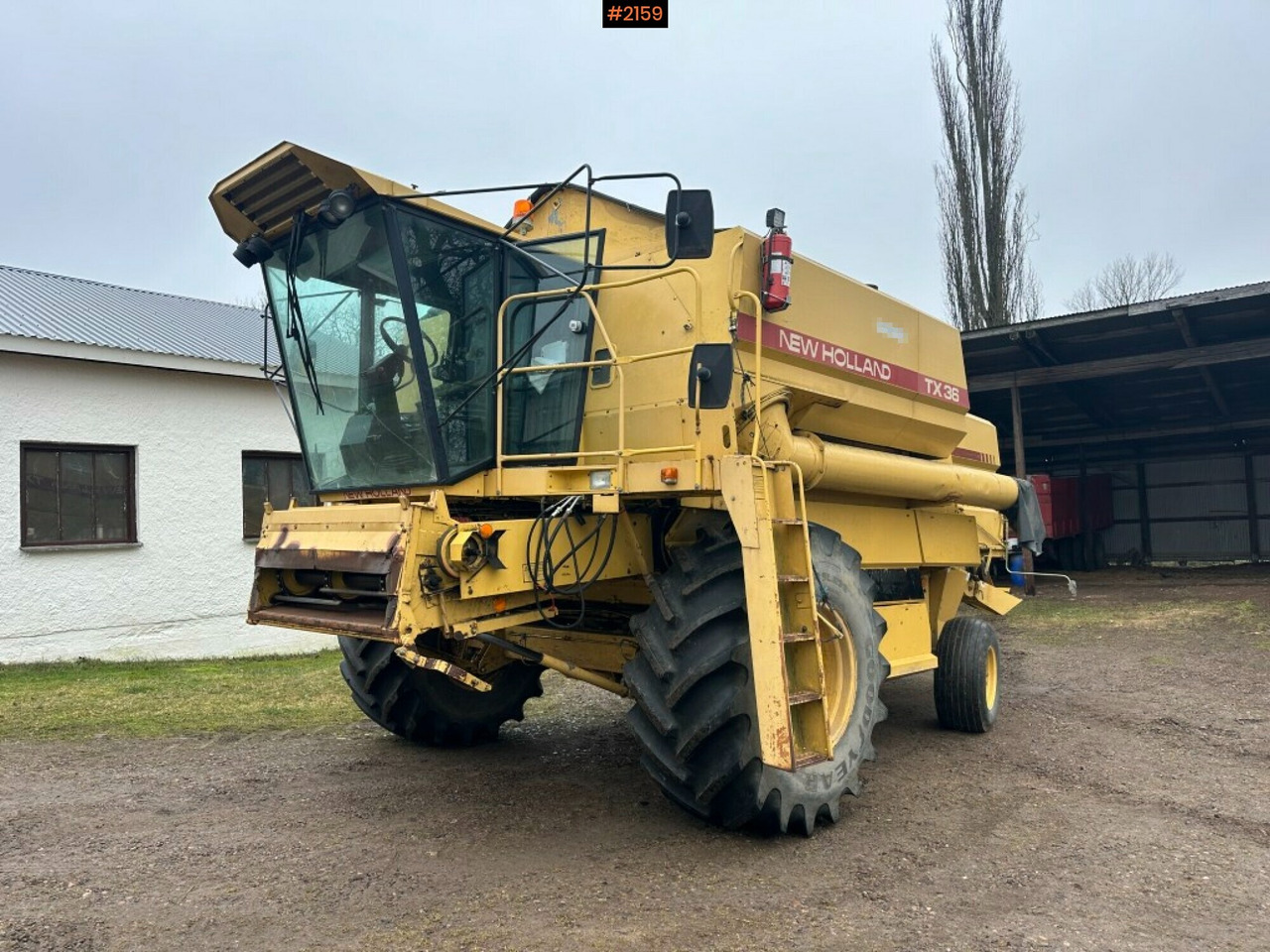 Combine harvester New Holland TX36 20 ft header with wagon (see video) - Mietitrebbia: foto 1 Combine harvester New Holland TX36 20 ft header with wagon (see video) - Mietitrebbia: foto 1