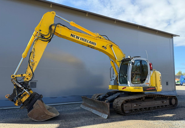 New HollandE235SR - Escavatore cingolato: foto 1 New HollandE235SR - Escavatore cingolato: foto 1