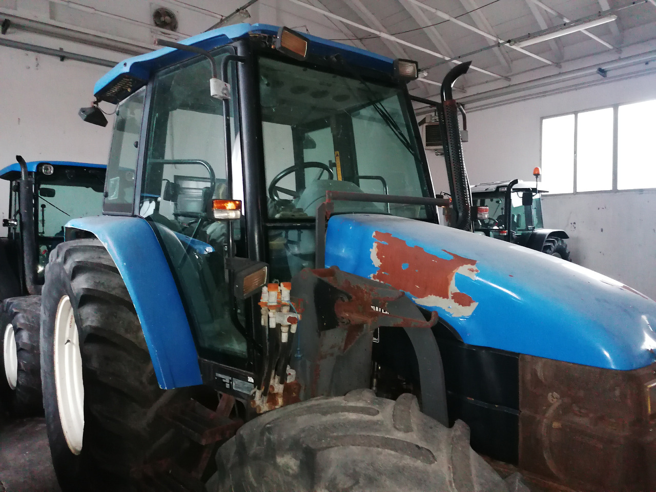 NEW HOLLAND TL 90 - Trattore: foto 1 NEW HOLLAND TL 90 - Trattore: foto 1