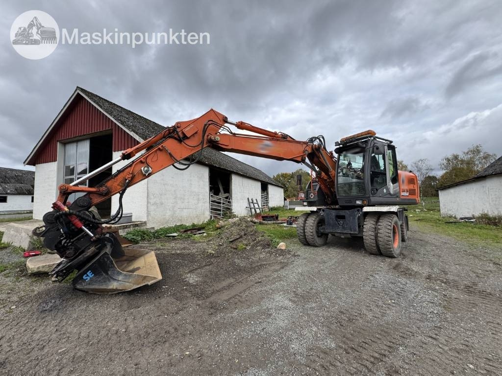 Hitachi ZX 140 W-3 - Escavatore gommato: foto 1 Hitachi ZX 140 W-3 - Escavatore gommato: foto 1