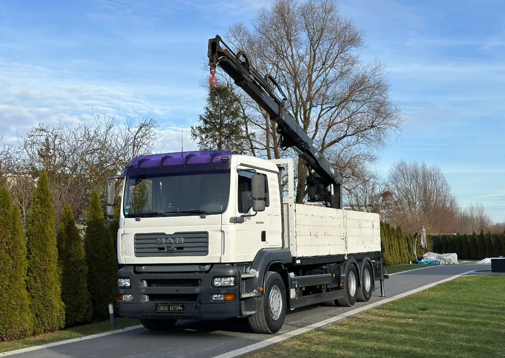 MAN TGA 24.410 6x4 HIAB MANUAL - Autocarro con pianale/ Cassone fisso, Camion con gru: foto 1 MAN TGA 24.410 6x4 HIAB MANUAL - Autocarro con pianale/ Cassone fisso, Camion con gru: foto 1