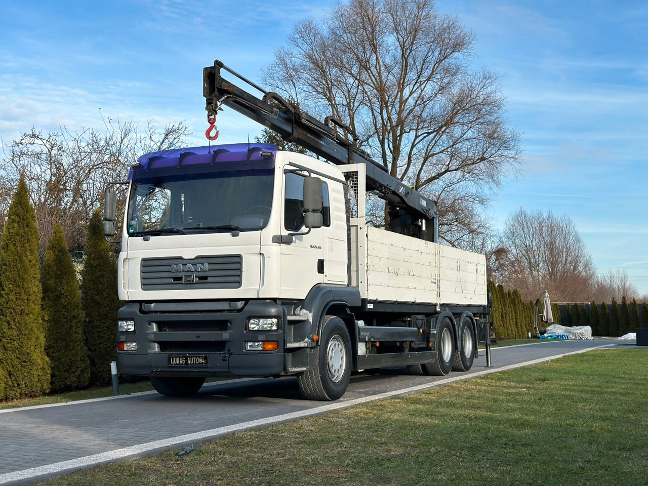 MAN TGA 26.410 6x4 HIAB MANUAL - Camion con gru: foto 1 MAN TGA 26.410 6x4 HIAB MANUAL - Camion con gru: foto 1