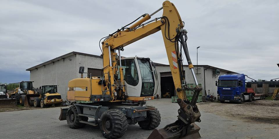 Koparka kołowa Liebherr A314 Litronic 9350 h+ 5 łyżek kołówka - Escavatore gommato: foto 4 Koparka kołowa Liebherr A314 Litronic 9350 h+ 5 łyżek kołówka - Escavatore gommato: foto 4