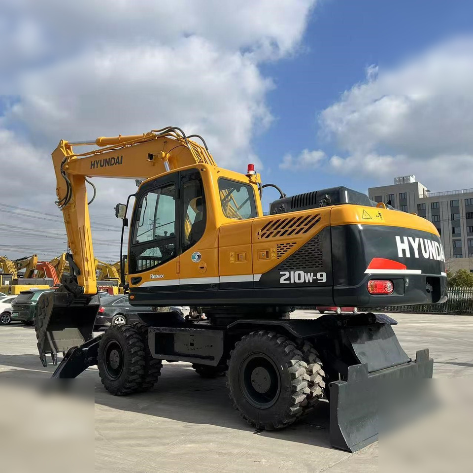 HYUNDAI ROBEX 210W-9 - Escavatore gommato: foto 1 HYUNDAI ROBEX 210W-9 - Escavatore gommato: foto 1