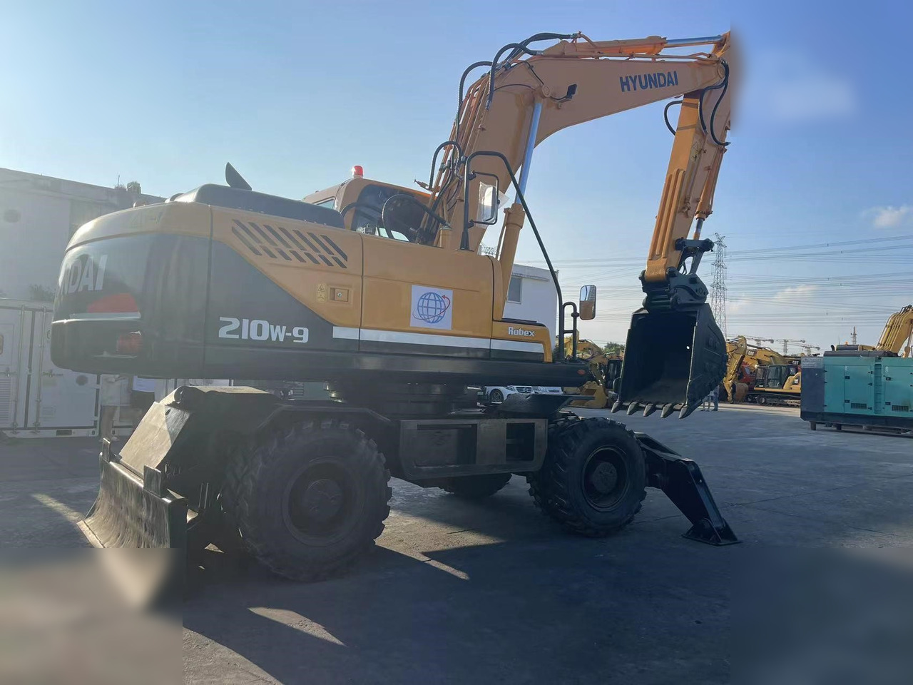 HYUNDAI ROBEX 210W-9S - Escavatore gommato: foto 2 HYUNDAI ROBEX 210W-9S - Escavatore gommato: foto 2
