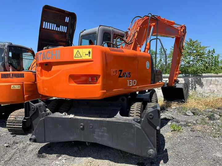Used Wheel Excavator Hitachi ZX 130W Made in Japan 13ton Hitachi Zx130w Wheel Excavator Price Used Hitachi Zx130 Excavator SALE - Escavatore: foto 2 Used Wheel Excavator Hitachi ZX 130W Made in Japan 13ton Hitachi Zx130w Wheel Excavator Price Used Hitachi Zx130 Excavator SALE - Escavatore: foto 2