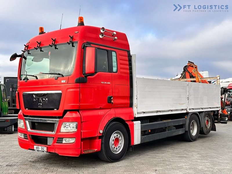 MAN TGX 26.480 Ciężarówka burtowa MAN TGX 26.480 6X2 / PALFINGER PK9002-EH B Crane / 80% Michelin - Camion con gru: foto 4 MAN TGX 26.480 Ciężarówka burtowa MAN TGX 26.480 6X2 / PALFINGER PK9002-EH B Crane / 80% Michelin - Camion con gru: foto 4