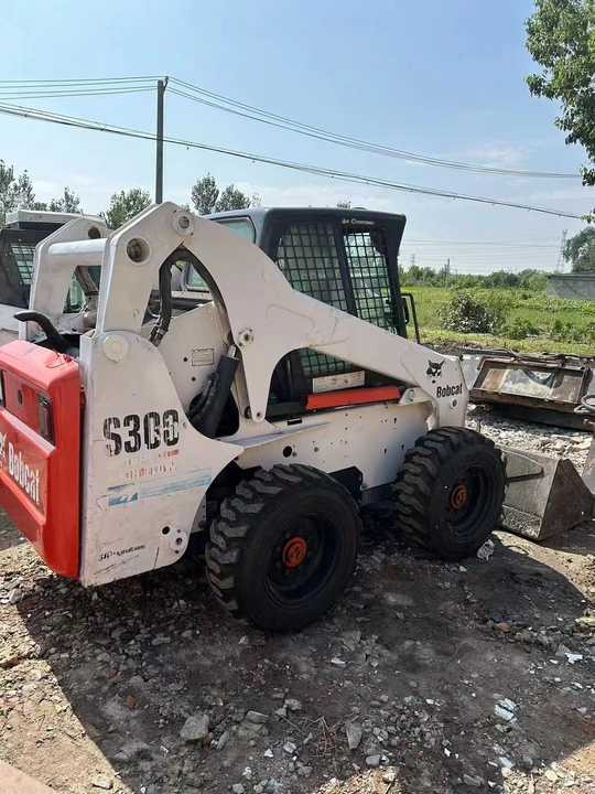 Used Bob Cat Bob Cat S300 Used Skid Steer Wheel Loader Multifunctional Track Loaders Bobcat - Pala gommata: foto 3 Used Bob Cat Bob Cat S300 Used Skid Steer Wheel Loader Multifunctional Track Loaders Bobcat - Pala gommata: foto 3