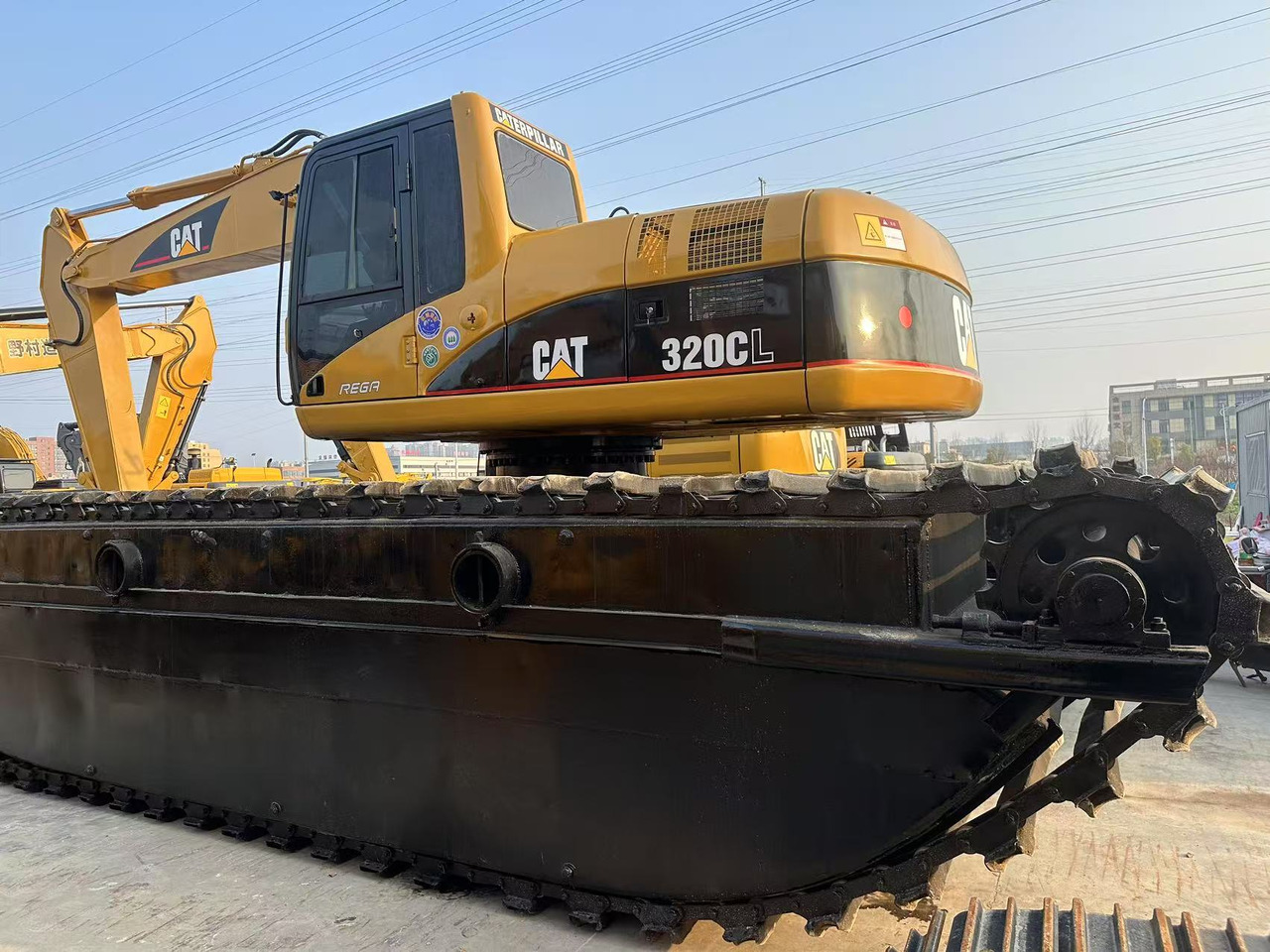 CATERPILLAR 320C - Escavatore anfibio: foto 2 CATERPILLAR 320C - Escavatore anfibio: foto 2