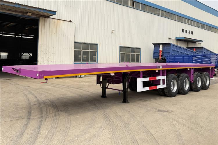TITAN 4 Axle 40ft Flatbed Semi Trailer for Sale In Guam - Semirimorchio cassonato/ Pianale: foto 1 TITAN 4 Axle 40ft Flatbed Semi Trailer for Sale In Guam - Semirimorchio cassonato/ Pianale: foto 1
