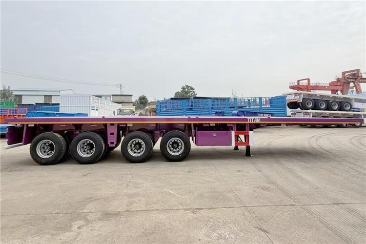 TITAN 4 Axle 40ft Flatbed Semi Trailer for Sale In Guam - Semirimorchio cassonato/ Pianale: foto 2 TITAN 4 Axle 40ft Flatbed Semi Trailer for Sale In Guam - Semirimorchio cassonato/ Pianale: foto 2