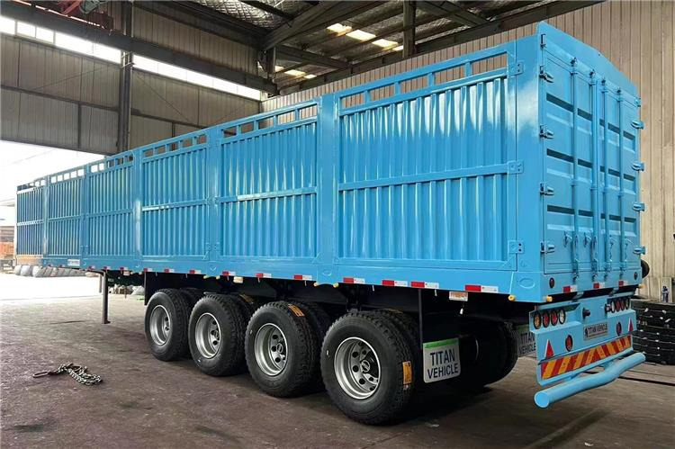 TITAN 4 Axle Fence Semi Truck Trailer for Sale price In Rwanda - Semirimorchio trasporto bestiame: foto 1 TITAN 4 Axle Fence Semi Truck Trailer for Sale price In Rwanda - Semirimorchio trasporto bestiame: foto 1