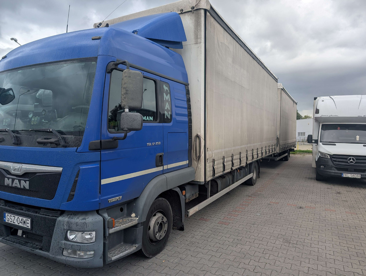 MAN TGL - Camion centinato: foto 1 MAN TGL - Camion centinato: foto 1