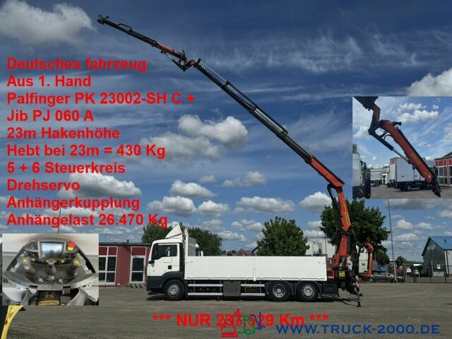 MAN TGS 26.400 PK 23002 mit Jib 23m Hakenhöhe 237TKM - Autocarro con pianale/ Cassone fisso, Camion con gru: foto 1 MAN TGS 26.400 PK 23002 mit Jib 23m Hakenhöhe 237TKM - Autocarro con pianale/ Cassone fisso, Camion con gru: foto 1