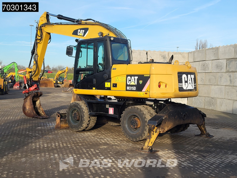 Caterpillar M315 D OUTRIGGERS + BLADE - Escavatore gommato: foto 3 Caterpillar M315 D OUTRIGGERS + BLADE - Escavatore gommato: foto 3