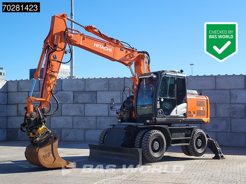 Hitachi ZX140W -5 OUTRIGGERS + BLADE - Escavatore gommato: foto 1 Hitachi ZX140W -5 OUTRIGGERS + BLADE - Escavatore gommato: foto 1