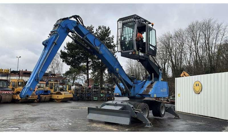 Fuchs MHL320 - Escavatore per movimentazione: foto 1 Fuchs MHL320 - Escavatore per movimentazione: foto 1
