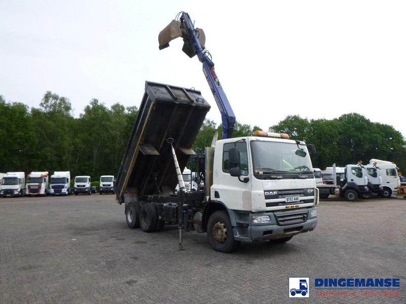 DAF CF 75.310 6x4 RHD tipper + HMF 1144 K-1 + grapple - Camion con gru: foto 2 DAF CF 75.310 6x4 RHD tipper + HMF 1144 K-1 + grapple - Camion con gru: foto 2