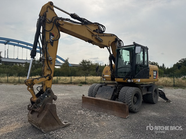 2012 Cat M313D Pelle Sur Pneus Wheel Excavator - Escavatore gommato: foto 1 2012 Cat M313D Pelle Sur Pneus Wheel Excavator - Escavatore gommato: foto 1