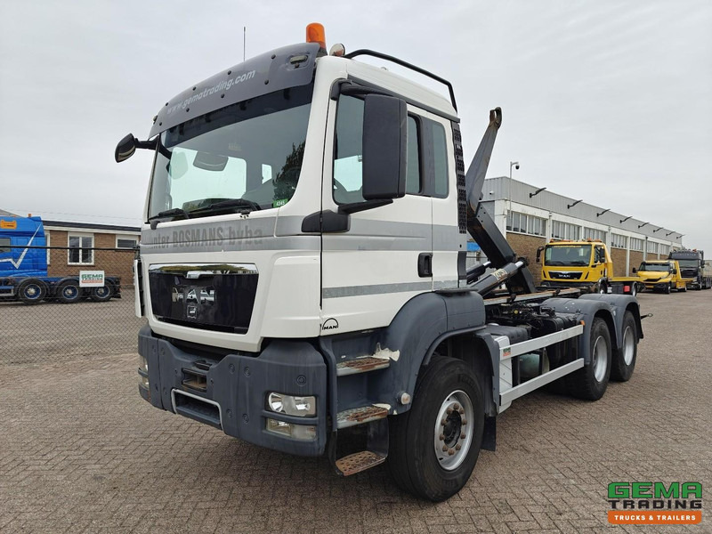 MAN TGS-TGX 26.440 6x4 Dagcabine Euro5 - AJK 20T HaakarmSysteem - Volledig Bladgeveerd - Naafreductie - Handgeschakeld - Autocarro scarrabile: foto 1 MAN TGS-TGX 26.440 6x4 Dagcabine Euro5 - AJK 20T HaakarmSysteem - Volledig Bladgeveerd - Naafreductie - Handgeschakeld - Autocarro scarrabile: foto 1