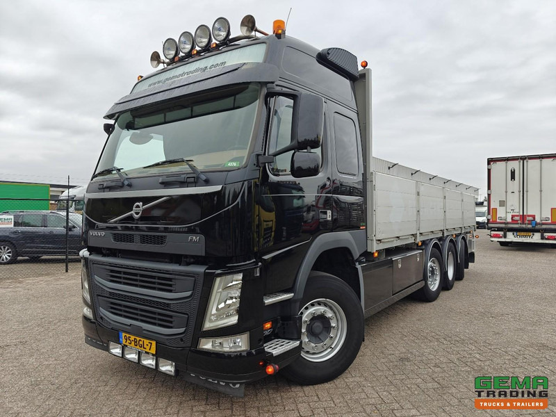 Volvo FM500 8x2/6 Globetrotter Euro6B - Open Laadbak 7.3M - HH Vloer - Alu Zijborden - Stuur/LiftAssen - Autocarro con pianale/ Cassone fisso: foto 1 Volvo FM500 8x2/6 Globetrotter Euro6B - Open Laadbak 7.3M - HH Vloer - Alu Zijborden - Stuur/LiftAssen - Autocarro con pianale/ Cassone fisso: foto 1