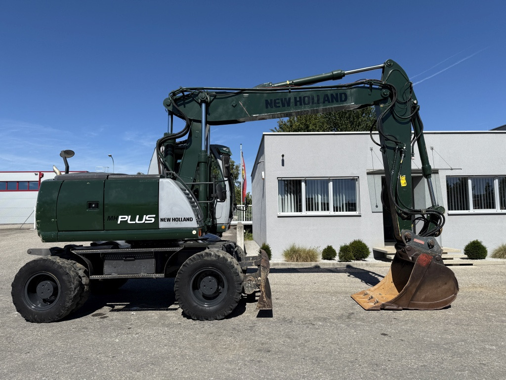 New Holland MH-Plus (111695) - Escavatore gommato: foto 5 New Holland MH-Plus (111695) - Escavatore gommato: foto 5