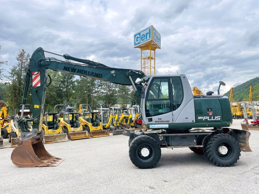 New Holland MH Plus (4054) - Escavatore gommato: foto 1 New Holland MH Plus (4054) - Escavatore gommato: foto 1