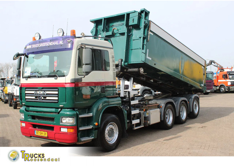 MAN TGA 35.400 8X4 + MANUAL! + NCH kipper/ bitum sprayer - Camion con sistema di cavi: foto 1 MAN TGA 35.400 8X4 + MANUAL! + NCH kipper/ bitum sprayer - Camion con sistema di cavi: foto 1
