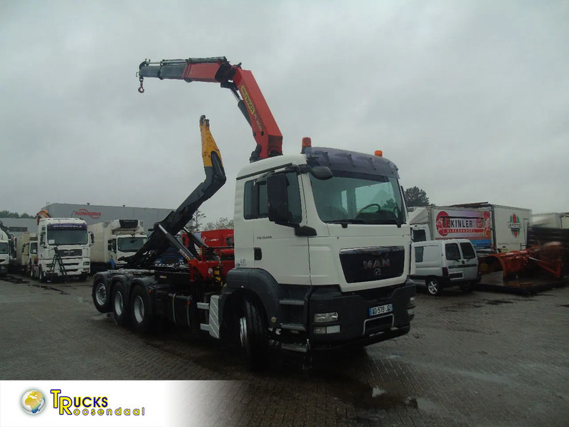 MAN TGS 35.440 + PALFINGER 24500 + 8X4 + EURO 5 + REMOTE - Autocarro scarrabile, Camion con gru: foto 1 MAN TGS 35.440 + PALFINGER 24500 + 8X4 + EURO 5 + REMOTE - Autocarro scarrabile, Camion con gru: foto 1