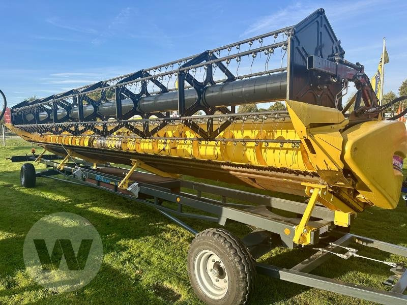 New Holland Schneidwerk 10,70 m - Barra di taglio per grano: foto 3 New Holland Schneidwerk 10,70 m - Barra di taglio per grano: foto 3