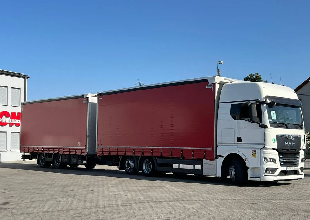 MAN TGX 26.470 z przyczepą Redos - Camion centinato: foto 2 MAN TGX 26.470 z przyczepą Redos - Camion centinato: foto 2