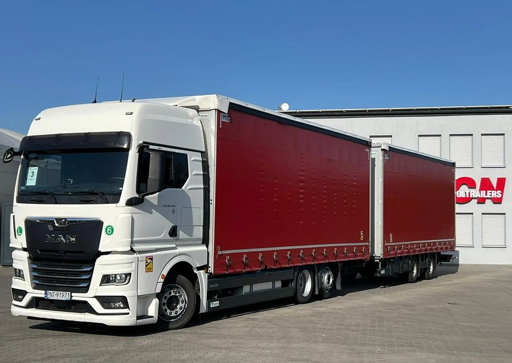 MAN TGX 26.470 z przyczepą Redos - Camion centinato: foto 1 MAN TGX 26.470 z przyczepą Redos - Camion centinato: foto 1