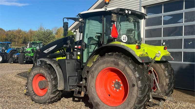 Claas ARION 650 CIS+ Focus med frontlift og frontlæsser - Trattore: foto 3 Claas ARION 650 CIS+ Focus med frontlift og frontlæsser - Trattore: foto 3