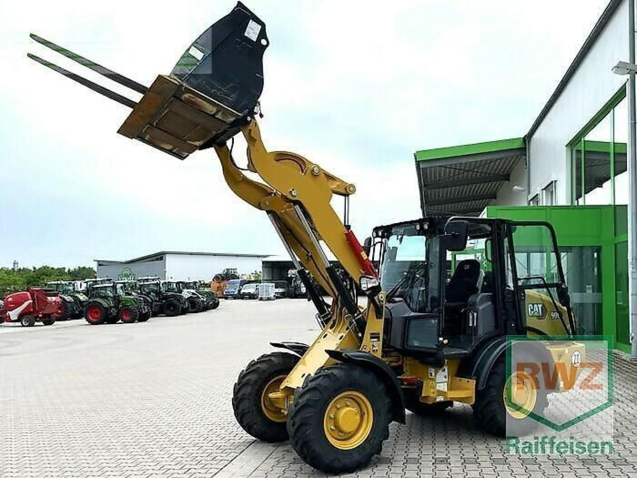 Caterpillar 906 radlader - Miniescavatore: foto 1 Caterpillar 906 radlader - Miniescavatore: foto 1