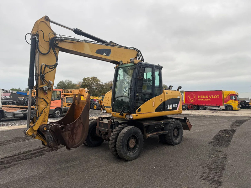 Caterpillar M313D 7212 HOURS - Escavatore gommato: foto 1 Caterpillar M313D 7212 HOURS - Escavatore gommato: foto 1