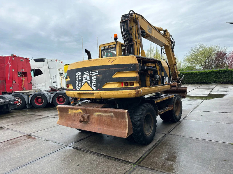 Escavatore gommato Caterpillar M315 +ROTO CE: foto 6