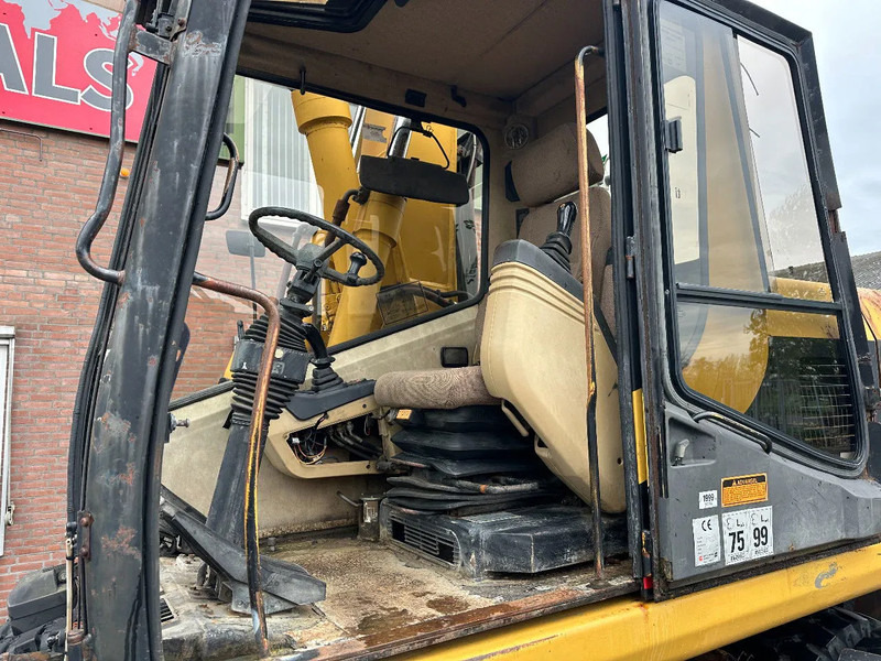 Escavatore gommato Caterpillar M315 +ROTO CE: foto 11