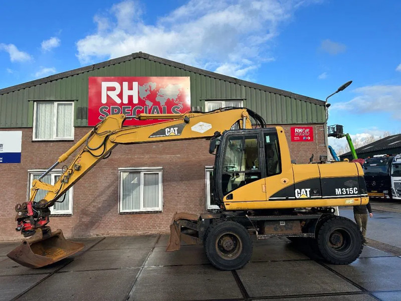 Caterpillar M315C WITH ROTOTILT, CE - Escavatore gommato: foto 1 Caterpillar M315C WITH ROTOTILT, CE - Escavatore gommato: foto 1