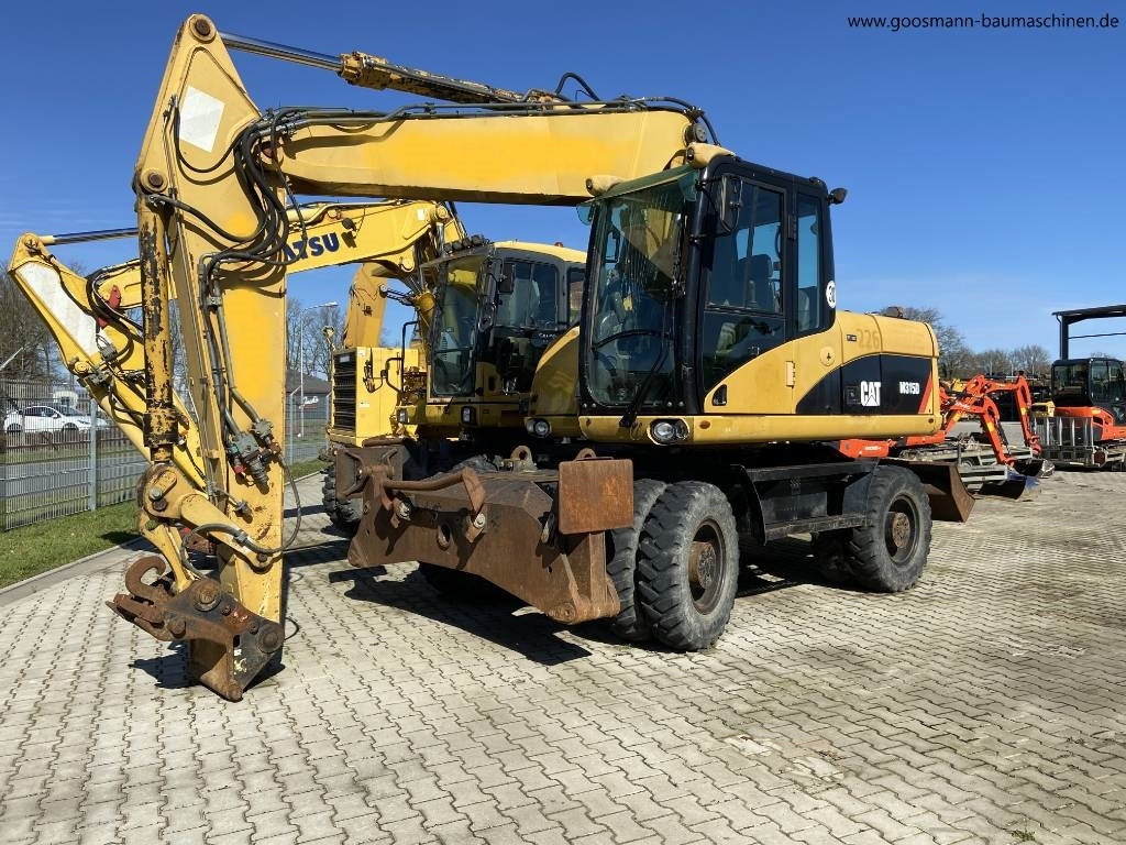 CAT M 315D - Escavatore gommato: foto 1 CAT M 315D - Escavatore gommato: foto 1