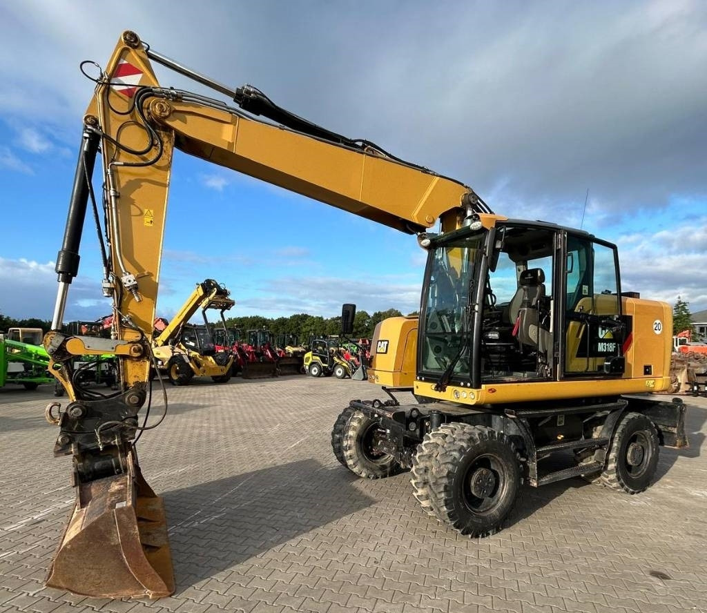 CAT M 318 F - Escavatore gommato: foto 1 CAT M 318 F - Escavatore gommato: foto 1