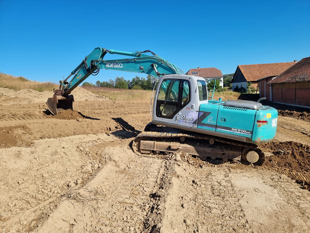 KOBELCO SK 210 NLC-6E - Escavatore cingolato: foto 1 KOBELCO SK 210 NLC-6E - Escavatore cingolato: foto 1