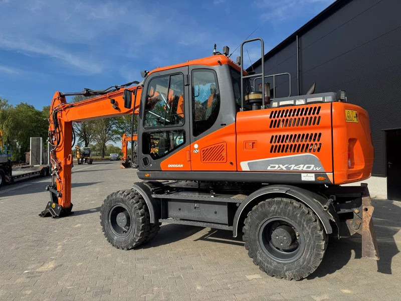 Doosan DX140-5 2018 - Escavatore gommato: foto 3 Doosan DX140-5 2018 - Escavatore gommato: foto 3