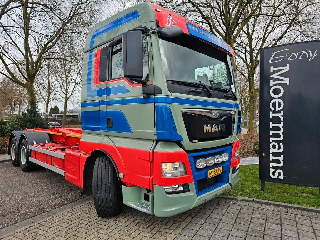 MAN TGX 26.560 XLX 6x4 Abrollkipper - Autocarro scarrabile: foto 1 MAN TGX 26.560 XLX 6x4 Abrollkipper - Autocarro scarrabile: foto 1