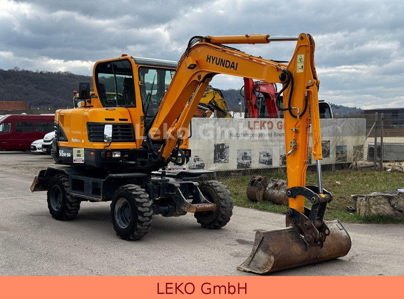 Hyundai Robex 55W-9A Mit Drei Löffeln - Escavatore gommato: foto 1 Hyundai Robex 55W-9A Mit Drei Löffeln - Escavatore gommato: foto 1