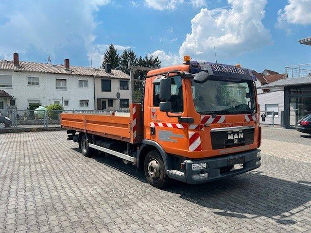 MAN 8.180 TGL Klima , Luftfederung - Autocarro con pianale/ Cassone fisso, Camion con gru: foto 1 MAN 8.180 TGL Klima , Luftfederung - Autocarro con pianale/ Cassone fisso, Camion con gru: foto 1