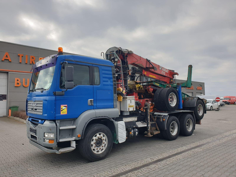 MAN TGA 26.480 6x4 LOGLIFT DOLL WOOD TRANSPORTER - Camion trasporto legname, Camion con gru: foto 1 MAN TGA 26.480 6x4 LOGLIFT DOLL WOOD TRANSPORTER - Camion trasporto legname, Camion con gru: foto 1