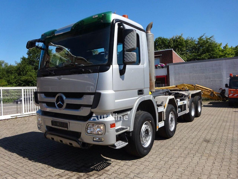 Mercedes-Benz Actros 3244 - Hook lift truck 8x4 - Autocarro scarrabile, Camion con gru: foto 1 Mercedes-Benz Actros 3244 - Hook lift truck 8x4 - Autocarro scarrabile, Camion con gru: foto 1
