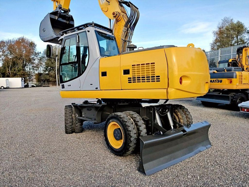 New Holland WE 190 - Escavatore gommato: foto 3 New Holland WE 190 - Escavatore gommato: foto 3