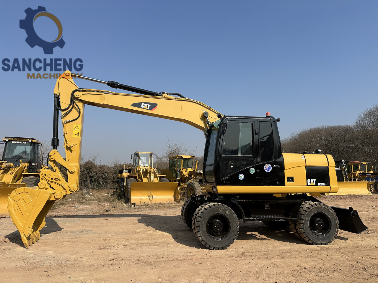 CATERPILLAR M320D2 - Escavatore gommato: foto 2 CATERPILLAR M320D2 - Escavatore gommato: foto 2